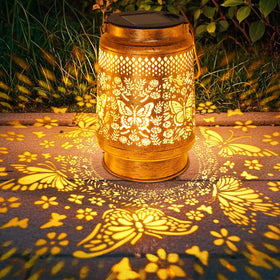Stadeco butterfly metal decor lantern adds stylish lighting to pathways.