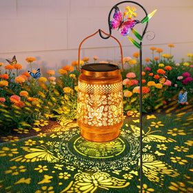Stadeco solar lantern with butterfly garden pattern provides cozy outdoor illumination.