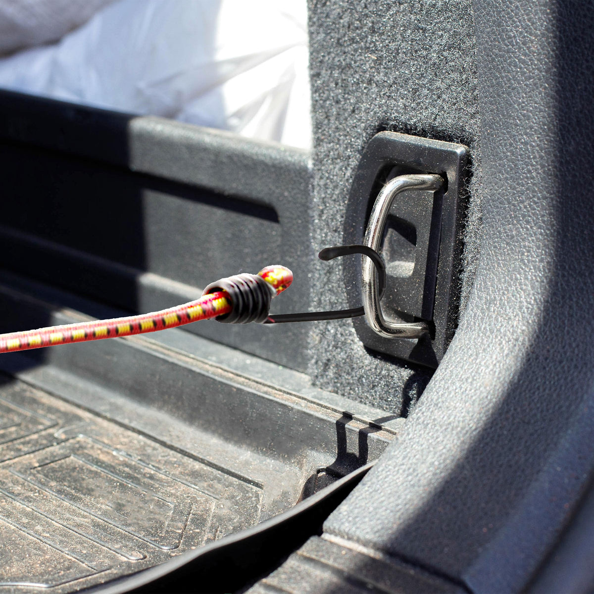 Stalwart bungee cord showing UV-resistant wrap for outdoor use.
