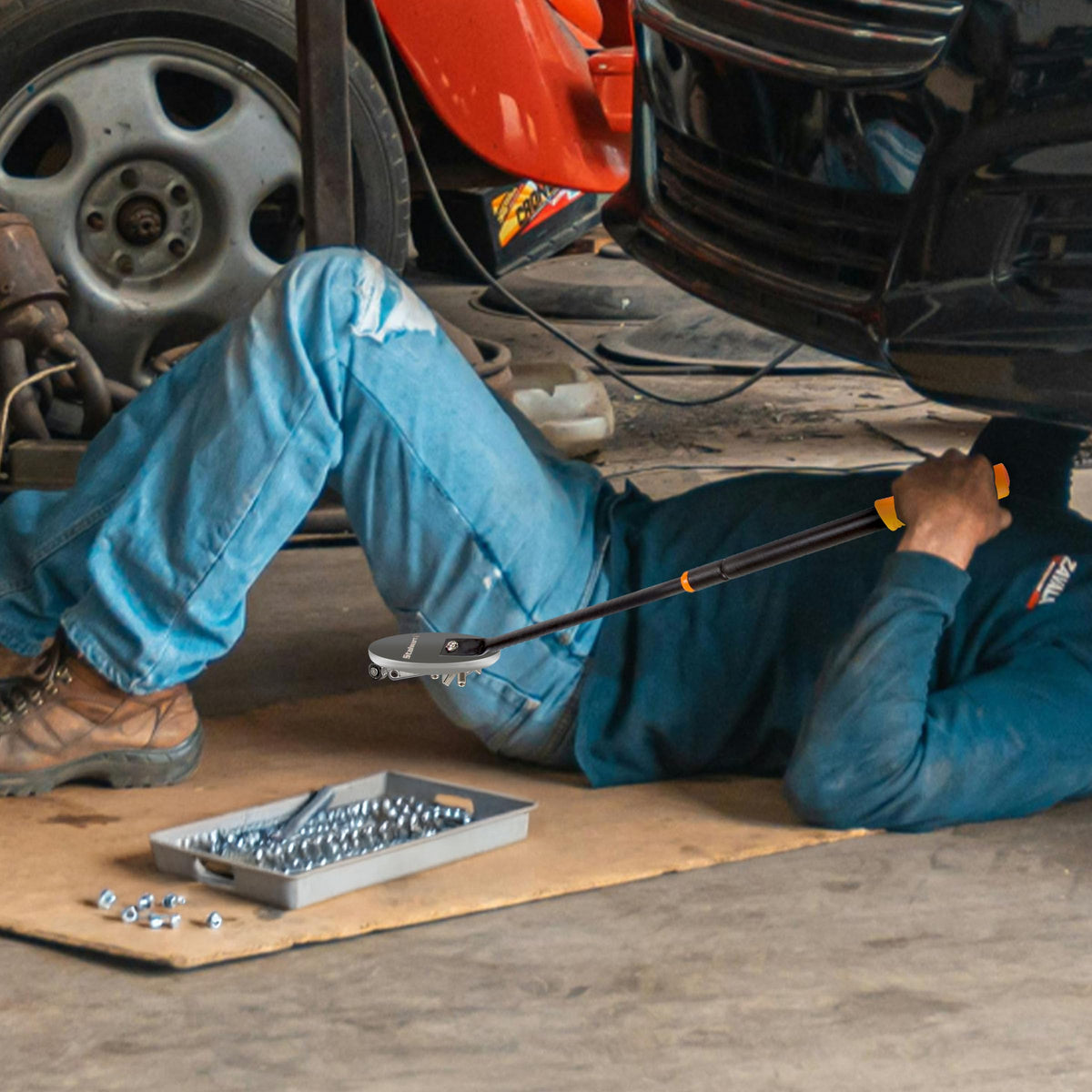 Stalwart orange design enhances visibility in workshops and garages.