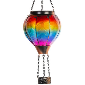 Starsoul hot air balloon solar lantern with glass shade lights the garden at night.