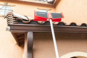 Steelman gutter guard with hanger gap design enabling access around gutters