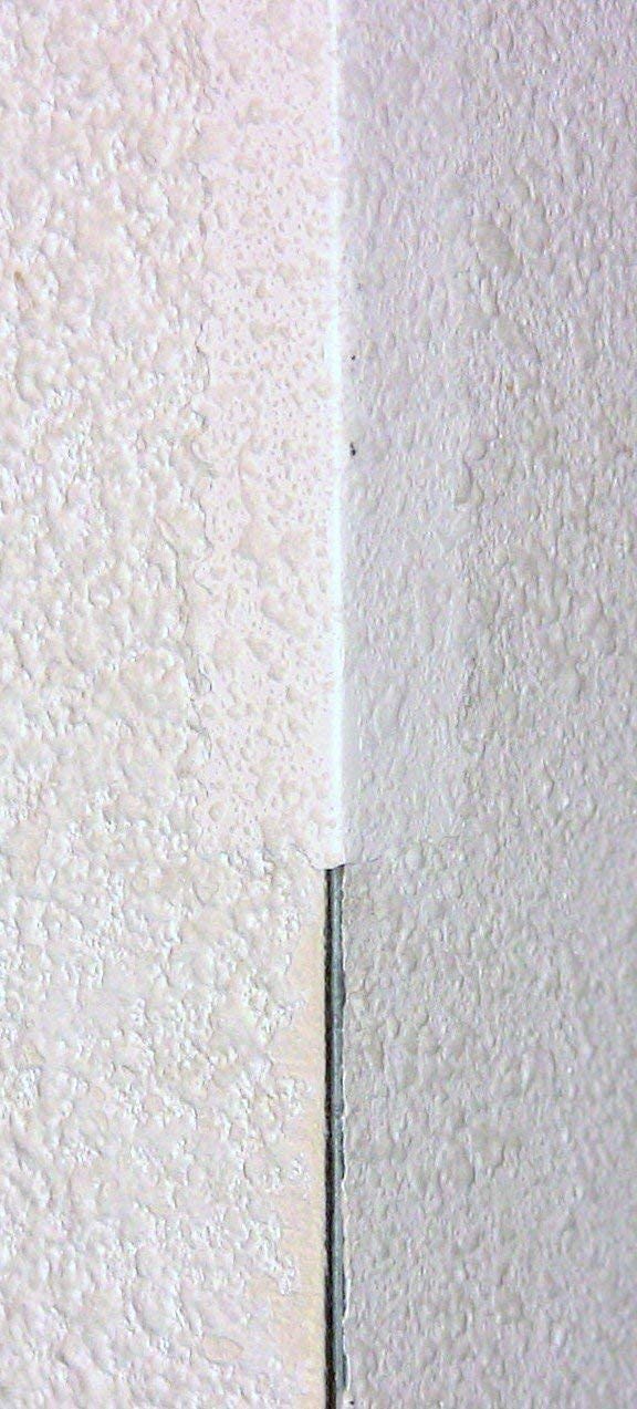 Stepsaver corner repair tape helps crease for accurate edge alignment.