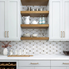 Close-up of STICKGOO Dolomite mosaic texture shows durable, waterproof surface.
