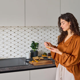 STICKGOO Dolomite mosaic tile installation is easy with interlocking edges.