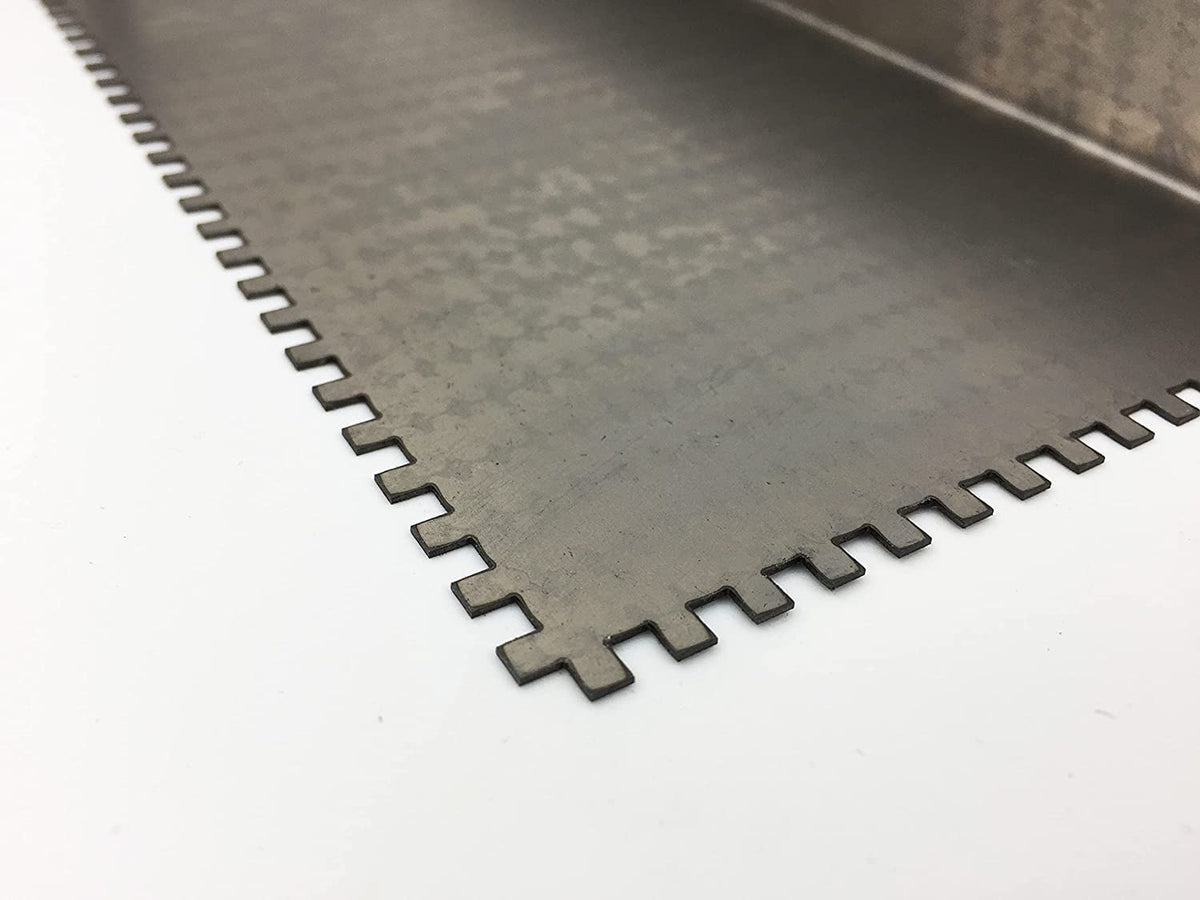 Stone Coat epoxy finish smoothing with steel notch trowel for professional results.