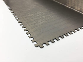 Stone Coat epoxy finish smoothing with steel notch trowel for professional results.