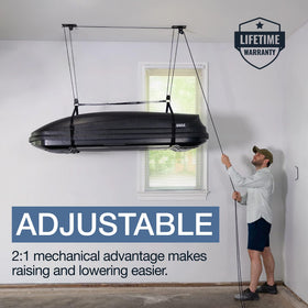StoreYourBoard cargo box pulley system in use demonstrates effortless lifting to the ceiling storage.