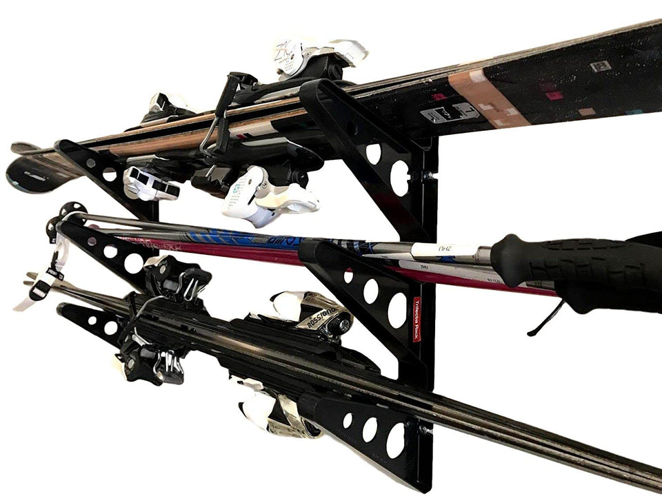 StoreYourBoard ski rack on wall with horizontal mount keeping skis off the ground and organized