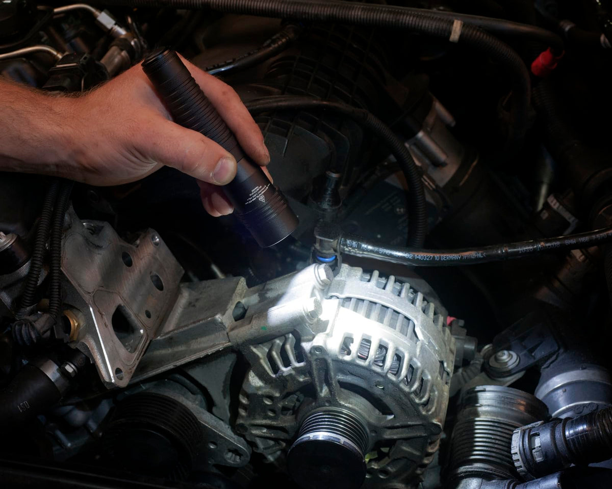 Streamlight Strion HL mode switch demonstrating high, medium, and low settings