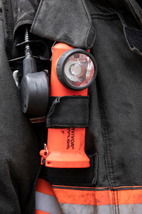 Clip secures Streamlight Survivor to belt or turnout gear