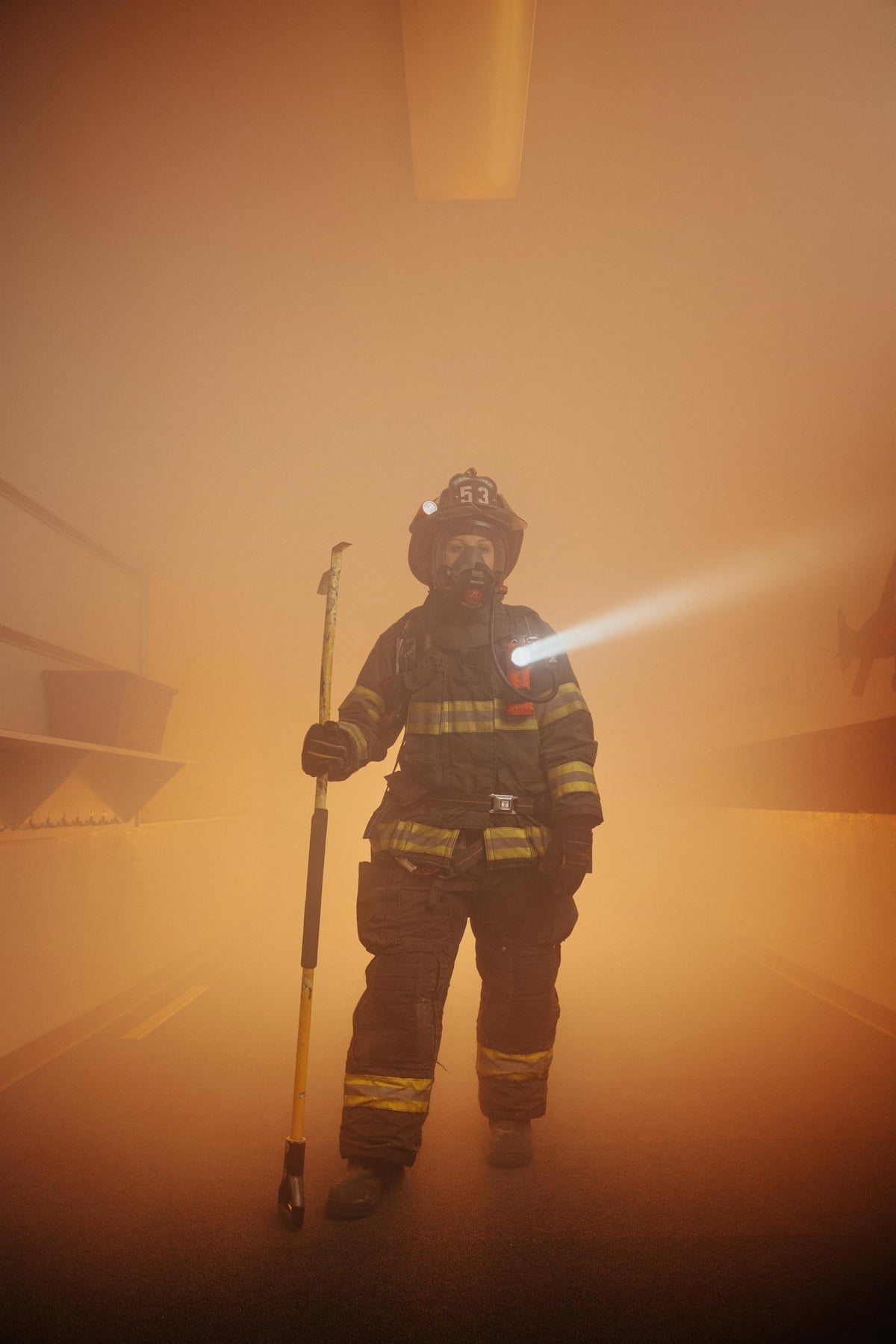 Streamlight Survivor X USB in-use firefighting scene demonstrates quick accessibility