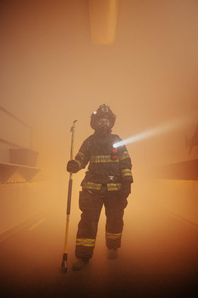 Streamlight Survivor X USB in-use firefighting scene demonstrates quick accessibility