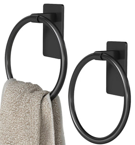STWWO black adhesive towel holder mounted on wall for space saving.