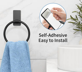 STWWO hand towel ring with self-adhesive backing for bathrooms.