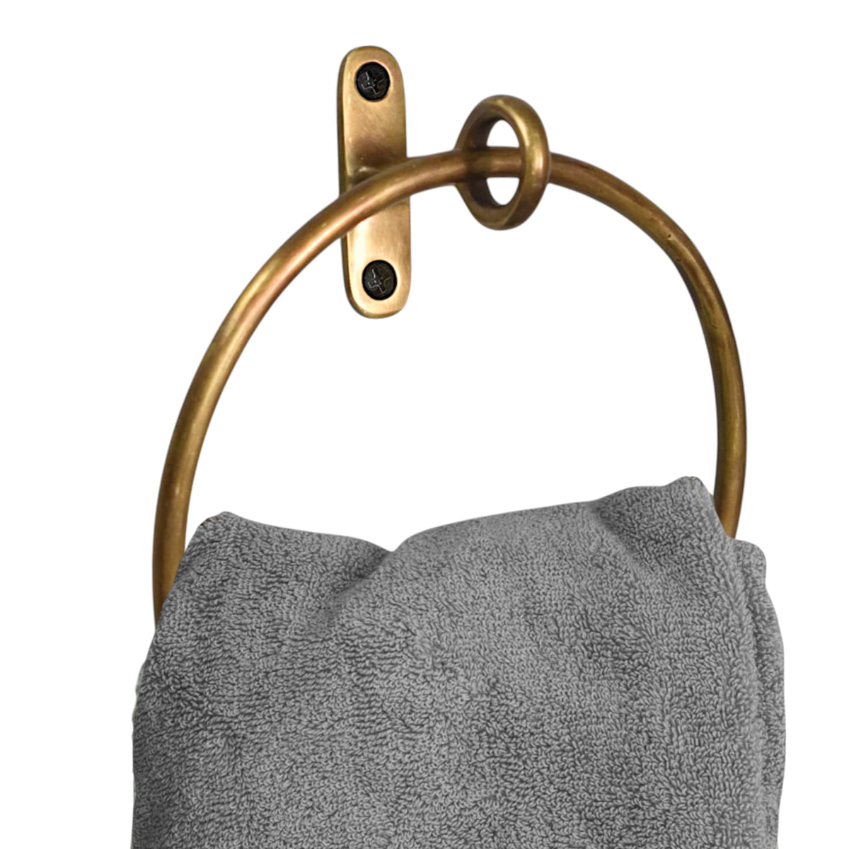 Stylentdecor brass towel ring, round design, keeps towels organized with durable elegance.