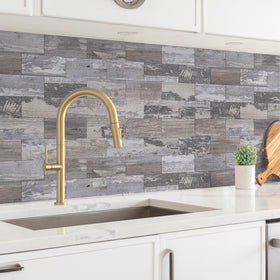 StyloVue adhesive tiles demonstrating easy peel-and-stick application