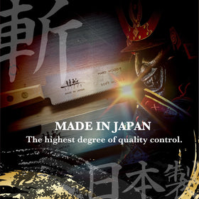SUIZAN double-edge handsaw in hand for controlled cuts.
