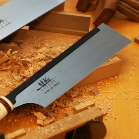 SUIZAN woodworking tool in action showcase for pull saw use.