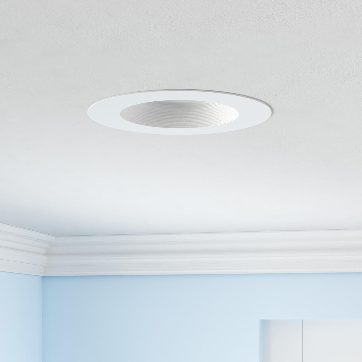 Sunco downlight fits 5- and 6-inch housings for flexible ceiling installation.