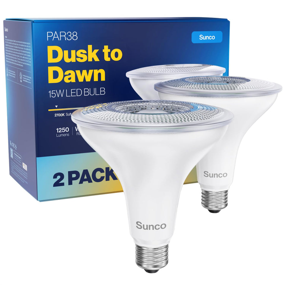 Sunco PAR38 dusk-to-dawn outdoor bulb lights exterior at sunset with warm glow.
