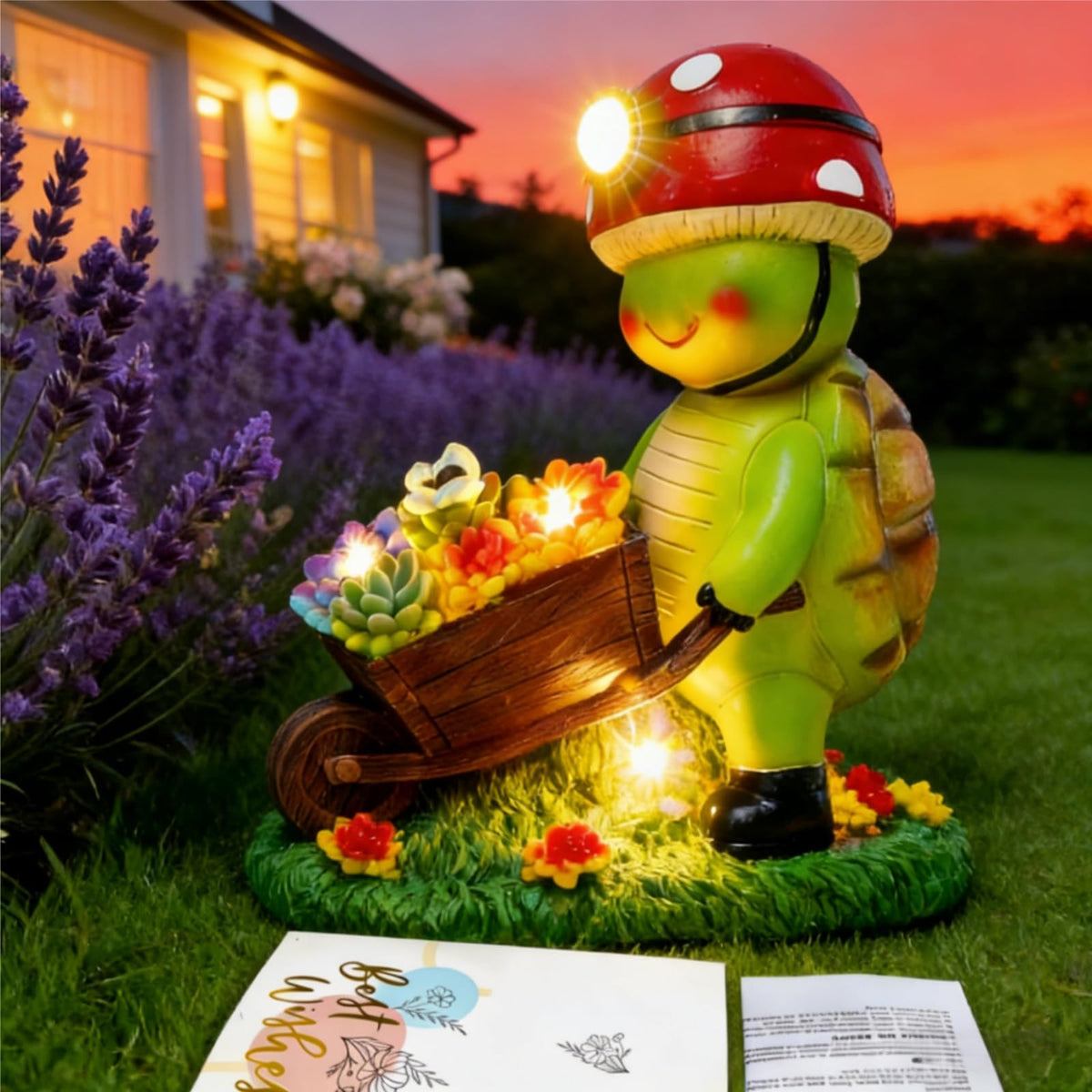SunGlee solar turtle statue casts warm light across a yard.