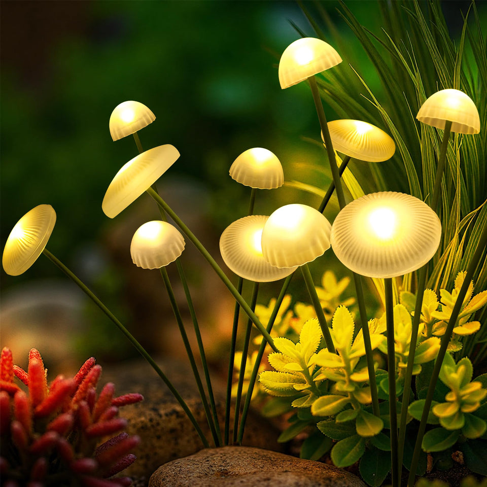 Sunket solar garden lights illuminate walkways with a warm mushroom glow and subtle motion.