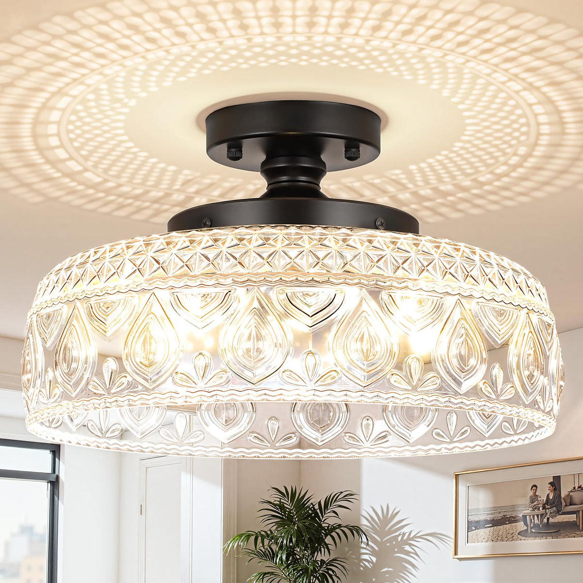 SunRider 3-light globe ceiling fixture showcases glass shade for warm, even kitchen lighting.