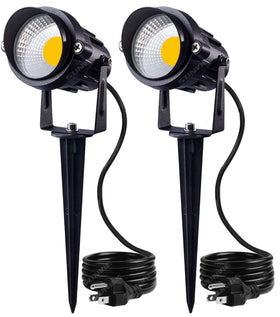 SunVIE outdoor landscape spotlight highlighting the garden path with warm 3000K glow