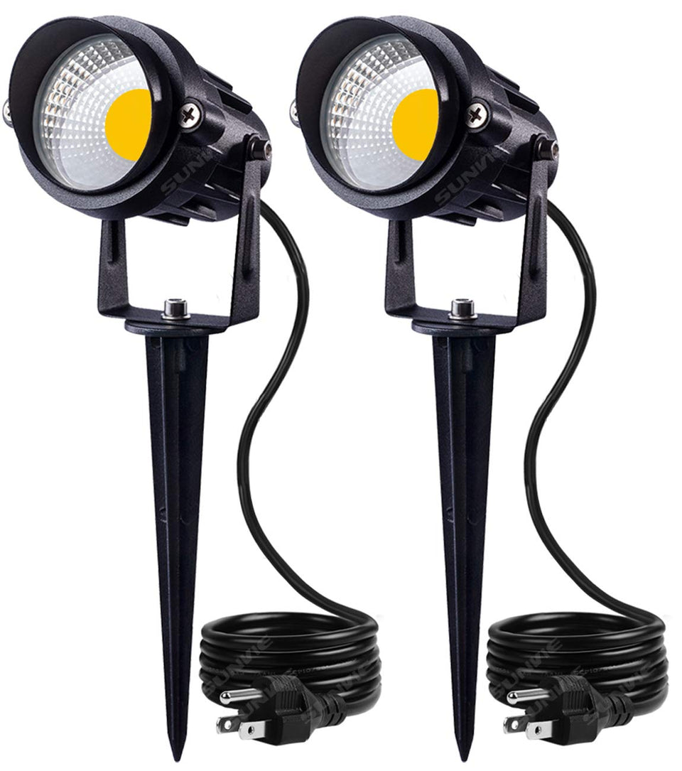 SunVIE outdoor landscape spotlight highlighting the garden path with warm 3000K glow