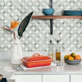 Sunwings kitchen island backsplash showcased with modern green marble finish.