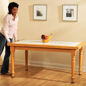 Beige Super Sliders shown under furniture aiding cleaning and rearranging