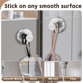 Supopular brushed nickel finish hook on tile preserves modern bathroom aesthetic.