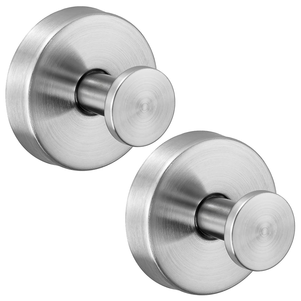 Supopular suction hook on glass door securely holds towels in humid bathrooms.