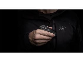 SureFire Stiletto Pocket Light clipped to gear for hands-free use