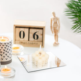 Suwimut DIY vase refresh with mirror tiles for a new look.