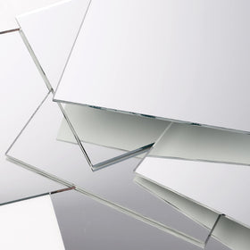 Suwimut mirror tiles as coasters for weddings and events.