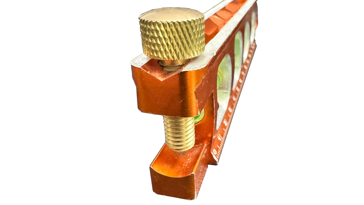 Swanson TL041M Savage level featuring brass pipe clamp for stable pipe setup.