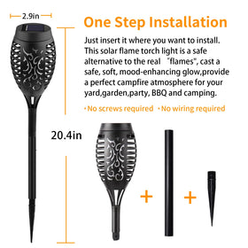 Close-up of Swingers solar torch LEDs flickering softly for cozy outdoor glow.