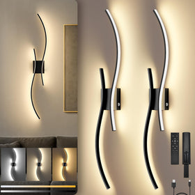 SyncGlow cordless wall sconce in black finishes for easy living room ambiance.