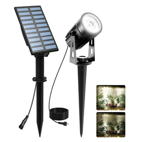 T-SUNUS Christmas solar spotlight beam highlights garden features with crisp glow.