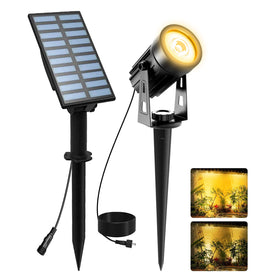 T-SUNUS Christmas solar spotlight with warm white glow for outdoor décor.