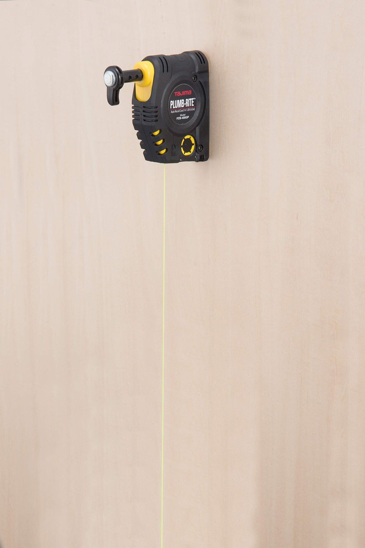 Tajima Plumb-Rite elastomer grip for a secure, non-slip handling.