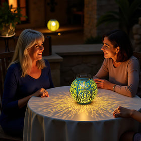 Take Me lanterns cast delicate shadow art on nearby surfaces.