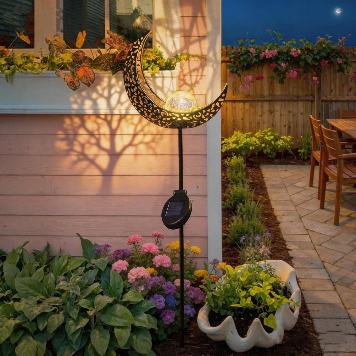TAKE ME Moon Solar Light walkway illuminates path at dusk.