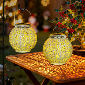 TAKE ME lights create nighttime ambiance in the garden.