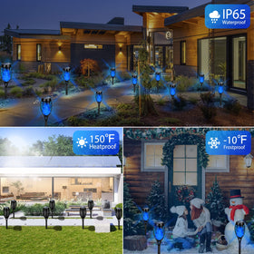 Tancuzo six-pack garden torch lights illuminate a lawn edge