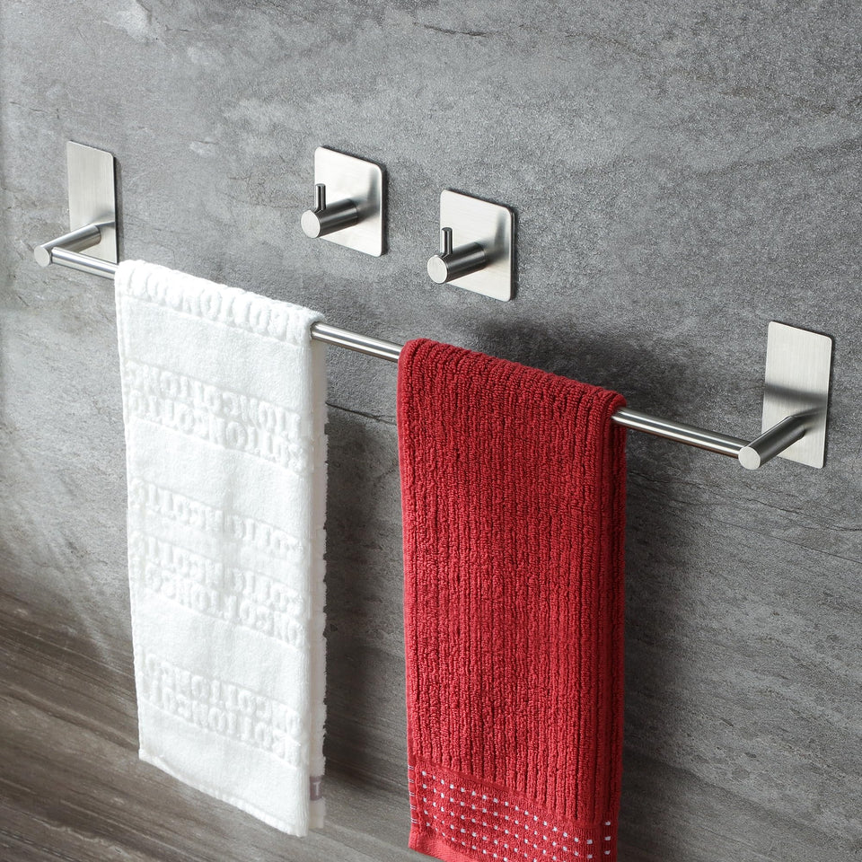 Taozun 24-inch towel bar on a sleek bathroom wall, offering ample hanging space for towels.