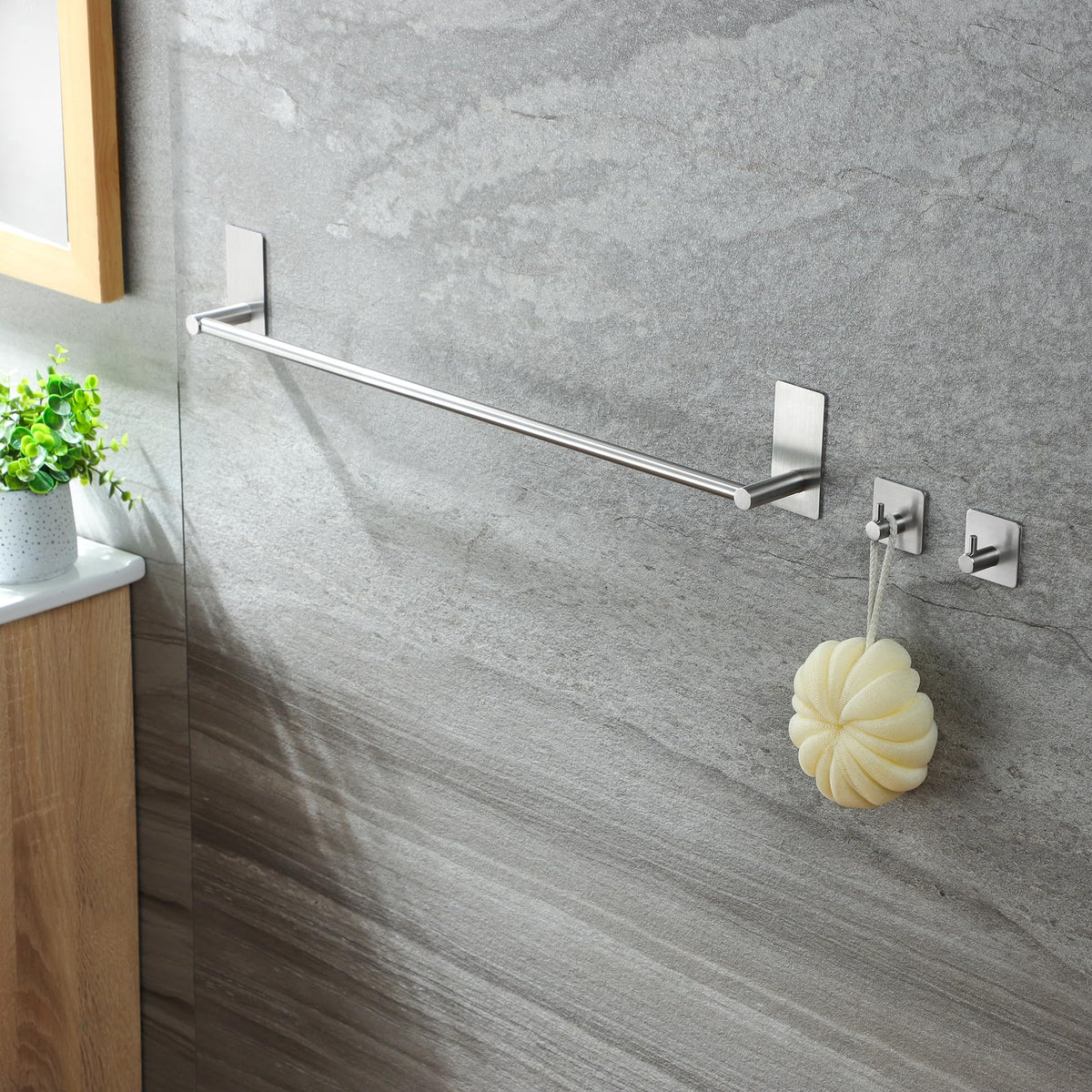 Taozun adhesive hooks pair securely to hold towels without drilling.