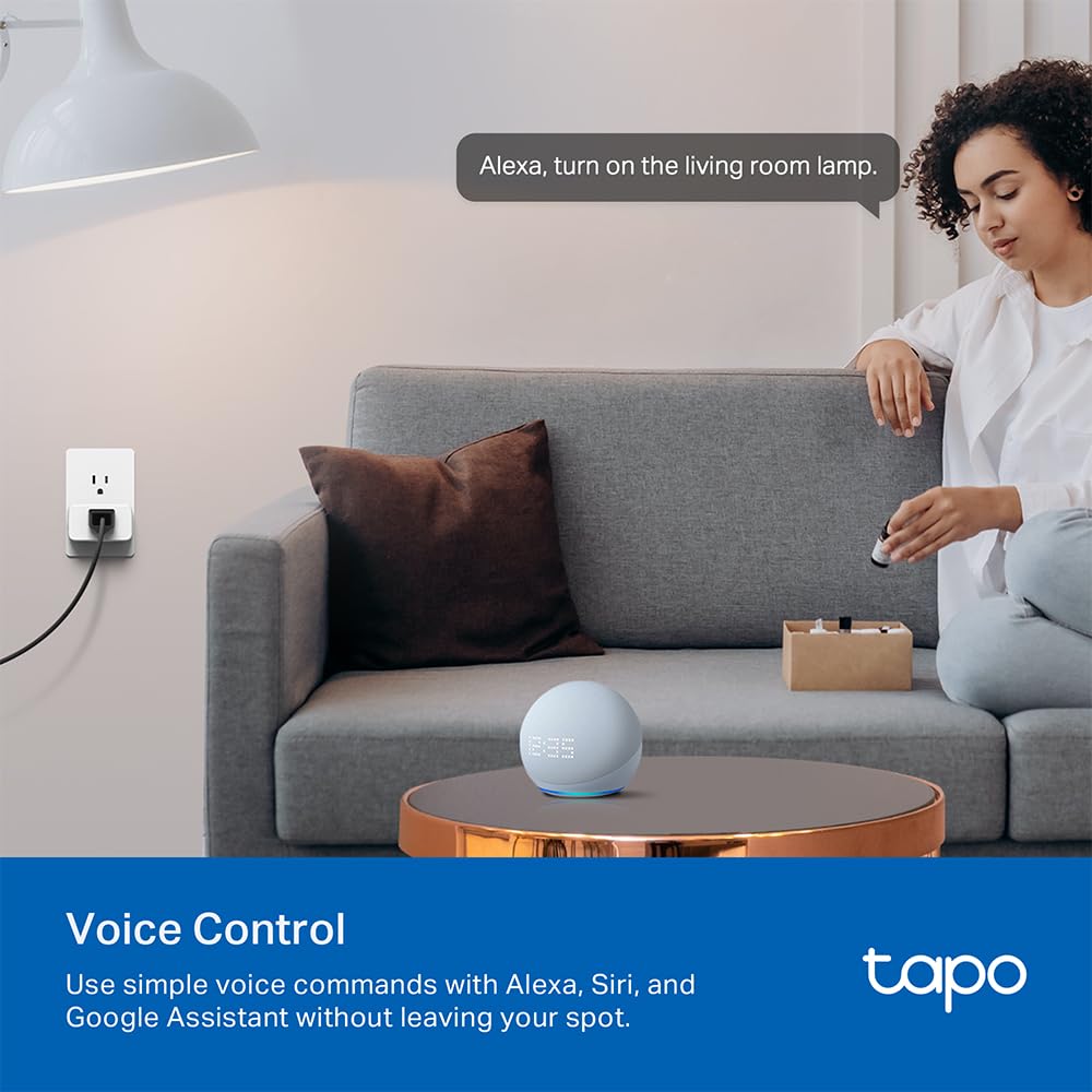 Tapo P110M compact-outlet-fit demonstrates unobtrusive placement beside neighbors.
